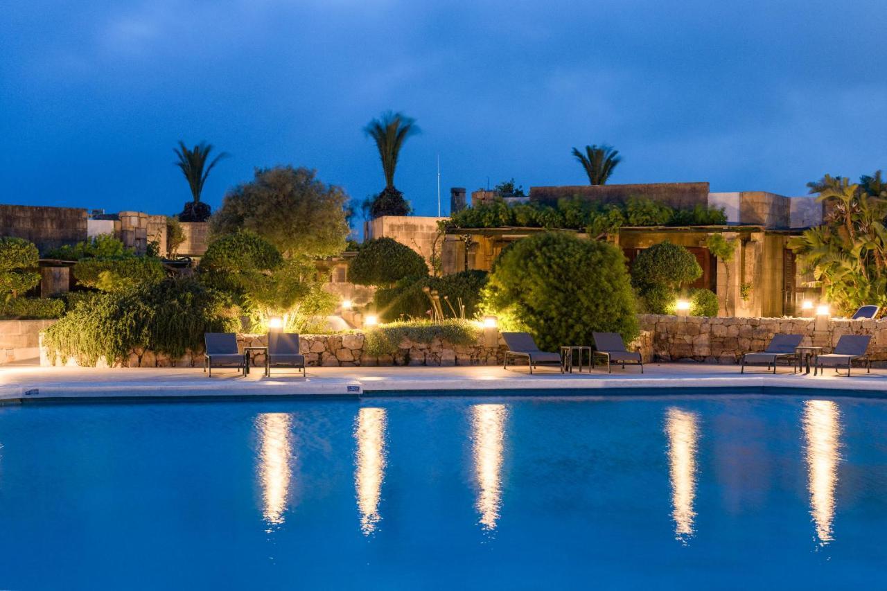 Hotel Ta' Cenc & Spa Sannat Exterior photo The resort at night